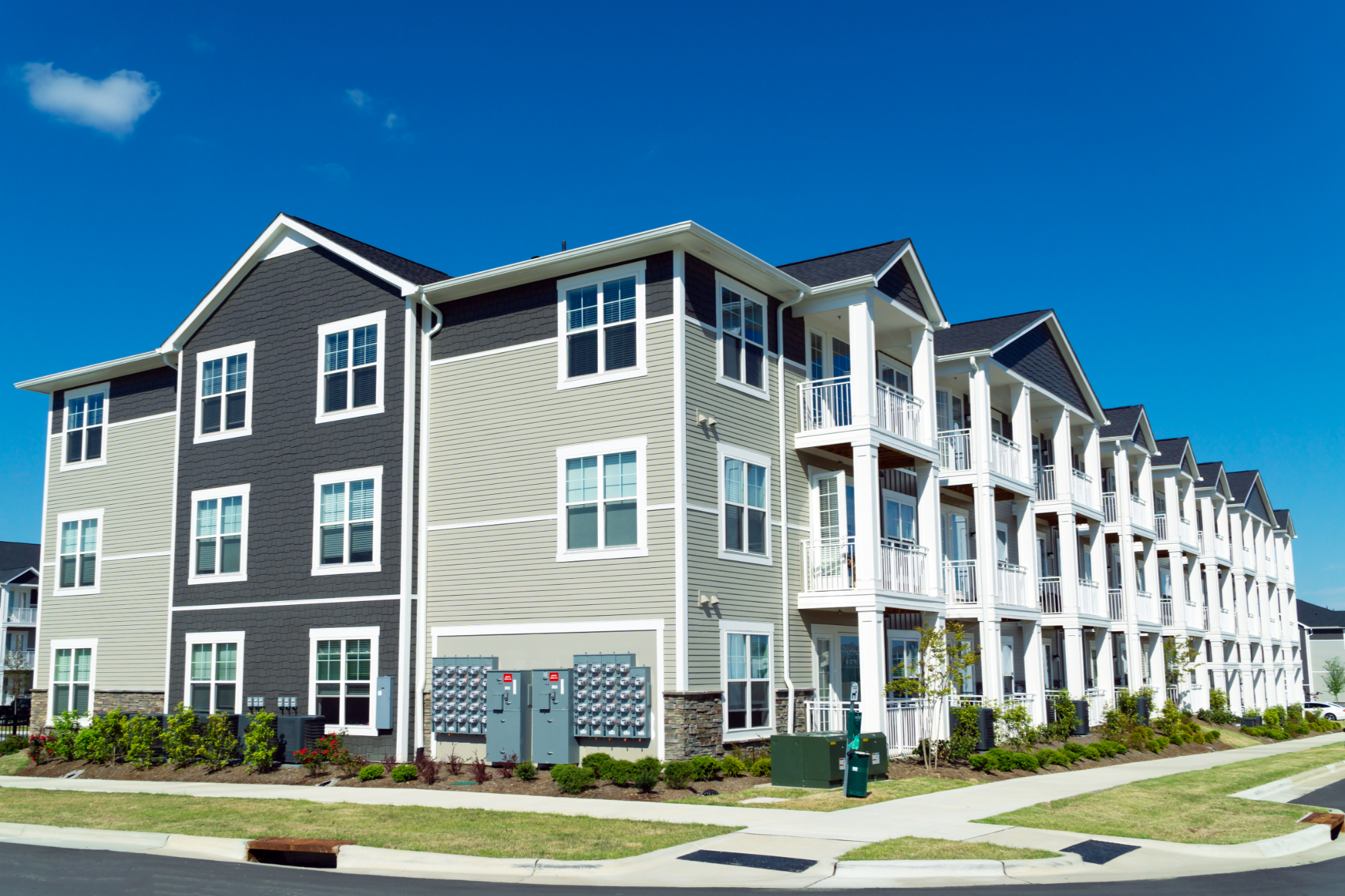 typical suburban apartment building with blue sky
