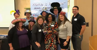 a group of people posing at the 2018 lender appreciation lunch in Las Vegas