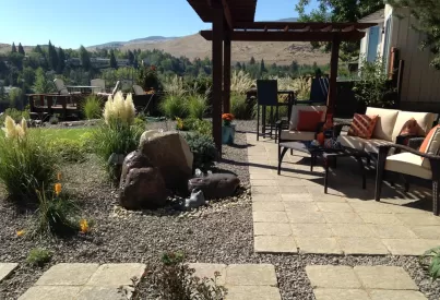 a backyard with patio furniture