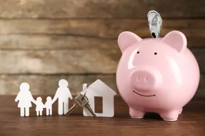 Piggy Bank with paper cutout of family